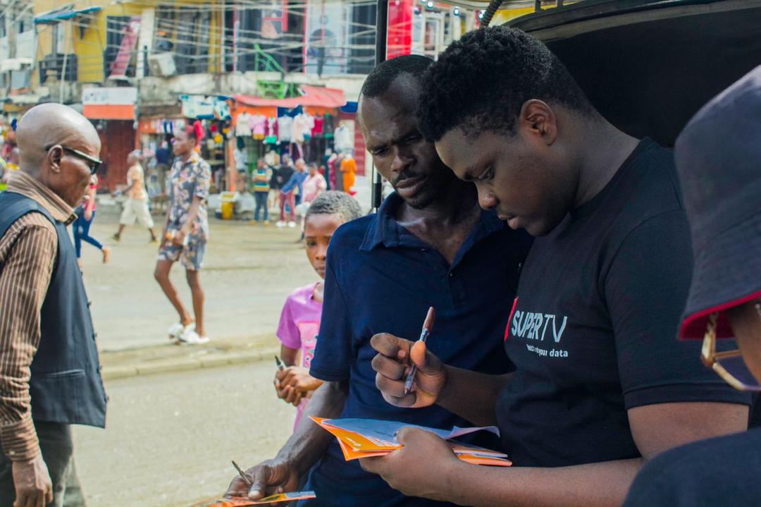 SuperTV Market Activation Train Storms Lagos